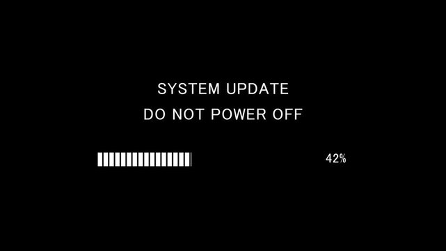 Video of loading progress bar with on-screen text system update do not power off on black background