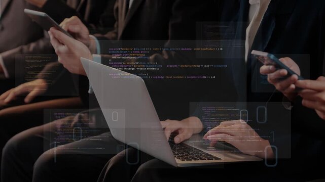 A group of professionals is engaged with their technology in a modern workspace, using laptops and smartphones, enhanced by a digital code overlay, showcasing innovation. Raster