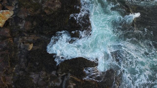 Foamy Waves Crashing Against Thacher Island Off The Coast Of Cape Ann In Massachusetts, USA. Aerial Topdown Shot