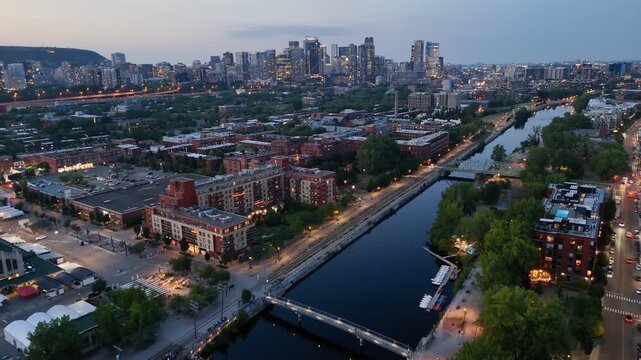 Aerial twilight view of Atwater Market and Montreal skyline, Quebec, Canada at blue hour. g.
