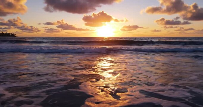 Sunset over ocean water waves.