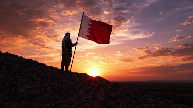 Bahraini man holding national flag on rocky hilltop at sunset, middle eastern landscape, patriotic concept, cinematic silhouette