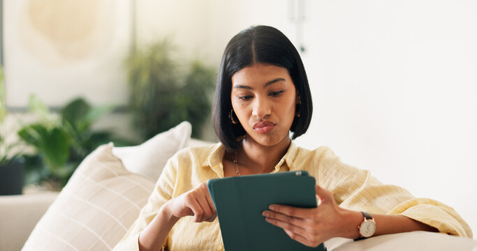 Tablet, research and woman on sofa in home with connection, news update or social media. Relax, digital technology and person reading blog on celebrity gossip on app in living room at apartment.