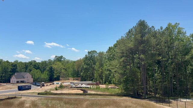 Static view of an unfinished residential property being built in a new neighborhood, highlighting high-quality craftsmanship. Perfect for subcontractor inspection and property development projects.