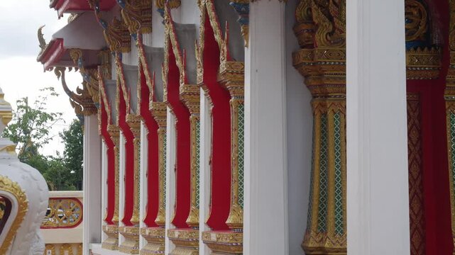 Ornate Thai Temple Roof Ornament Naga Gable Gold Mosaic Glass Detail Buddhist Architecture Decoration Cultural Heritage 