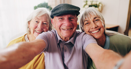 Fototapeta premium Portrait, selfie and smile of elderly people in retirement home together for bonding or memories. Community, happy and photograph with group of senior friends in apartment for social media or visit