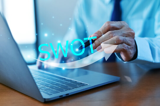 SWOT analysis concept, businessman drawing swot analysis strategy for business plan and growth