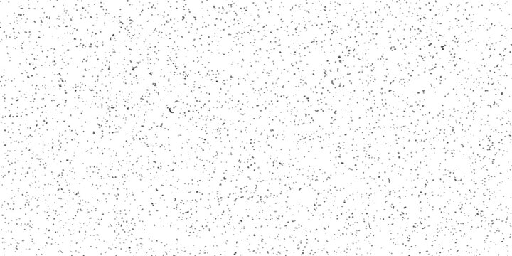 Abstract pattern of white and grey speckles, resembling a textured surface or digital noise.