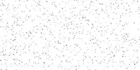 A field of countless tiny grey specks scattered randomly across a stark white background creates an abstract pattern of light and shadow, suggesting a subtle texture or a distant, blurred landscape. © MdKefaitUllah