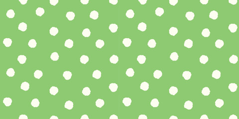 Playful seamless pattern with soft white polka dots on fresh green background creating cheerful textile print for fabric wrapping paper wallpaper stationery nursery decor and modern surface design © SpainArts