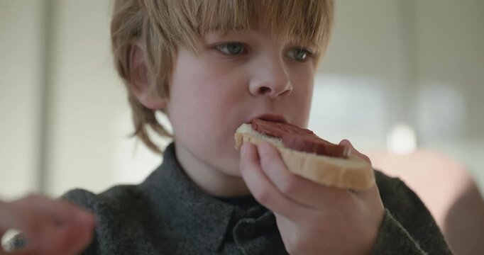 Kid Boy Eat Rice and Sausage. Eating Breakfast Lunch in Kitchen. 4K 10-bit