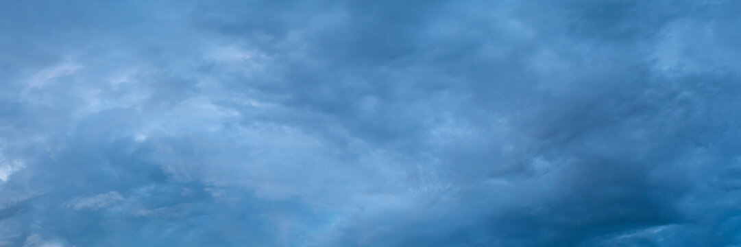 Dramatic panorama sky with storm cloud on a cloudy day. Panoramic image.