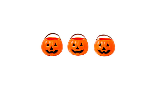 Three spooky Halloween pumpkin jacks isolated on transparent background