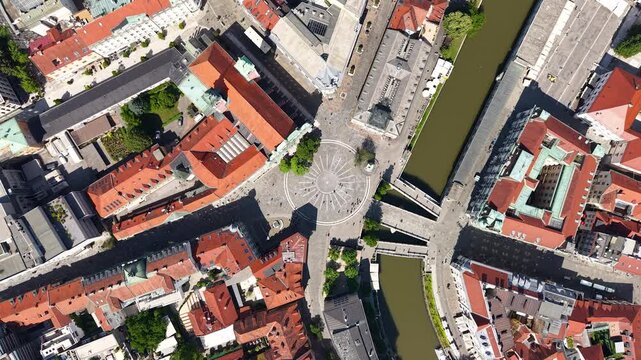 Ljubljana, Slovenia. Top Down Drone Shot of Preseren Square aold Old Town Buildings by River