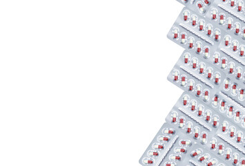 White-red capsule pill in blister pack isolated on white background. Prescription drug. Pharmaceutical industry. Pregabalin for nerve pain and anticonvulsant. Neuropathic drug. Pharmaceutical drug. © Fahroni