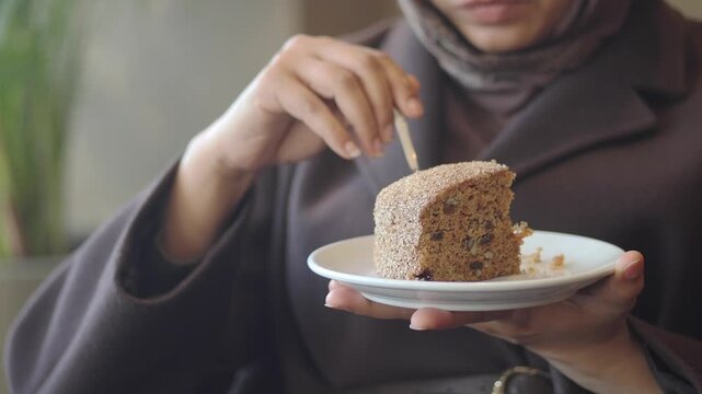 Delicate moments of savoring a delicious cake slice