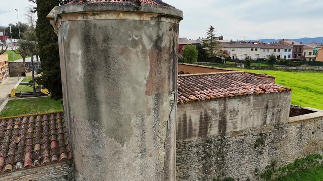 Beautiful landscapes near Vic in Catalonia. View from the historic buildings and lush green fields. This footage captures the harmony between nature and architecture.
