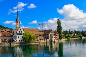 Fototapeta premium Scenic view of St. George Abbey monastery building on the Rhine river in Stein am Rhein rivershore, Switzerland