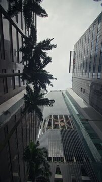 Modern urban architecture of a vertical city garden tower in Singapore City surrounded by financial offices innovative skyscrapers and metropolitan business life
