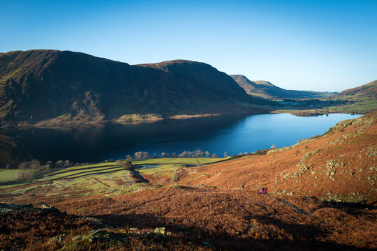 Views across Rannerdale, Crummock Water with the summit of Mellbreak in the distance in the Lake District on a sunny winters morning in Cumbria, England UK.