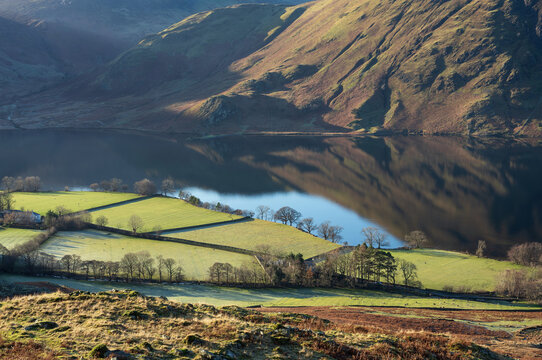 Looking down onto Rannerdale from the descent of Grasmoor with Mellbreak opposit in the nglish Lake District, Cumbria, England, UK
