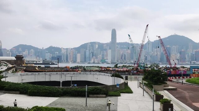 Hong Kong Skyline with Iconic Tower and Construction Activity