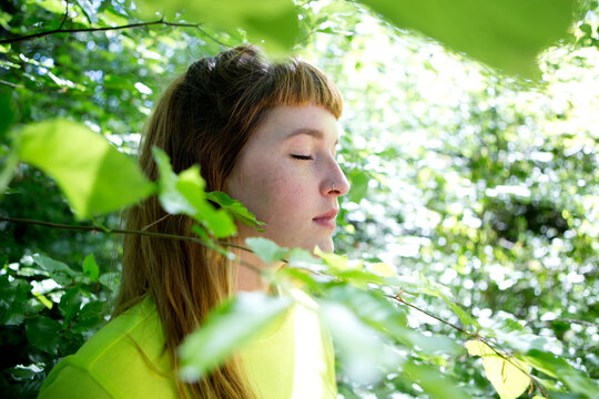 Portrait of young woman in the forest