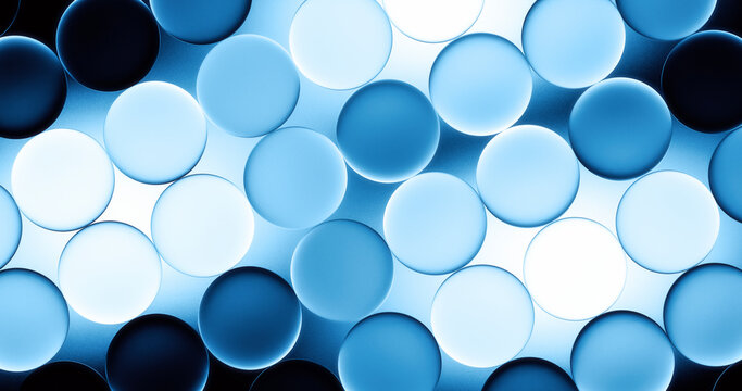 Glowing blue transparent glass spheres create an abstract background