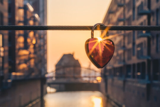 Germany, Hamburg, Love lock hanging on railing in Speicherstadt district
