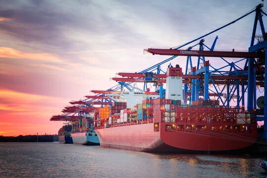 Germany, Hamburg, Port of Hamburg, Harbour, container ship in the evening