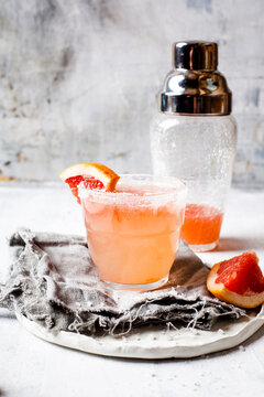 Mexican Paloma cocktail in salt rimmed glass