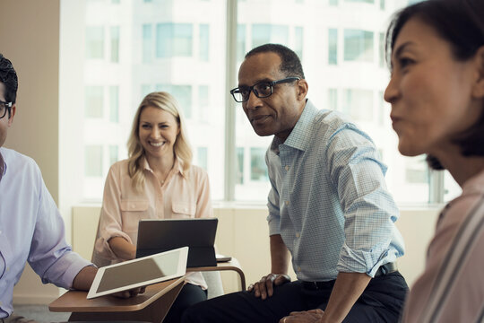 Business people in meeting having interesting discussion