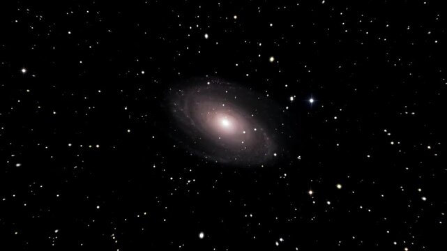 Spiral galaxy glows brightly within the vast darkness of the deep universe.