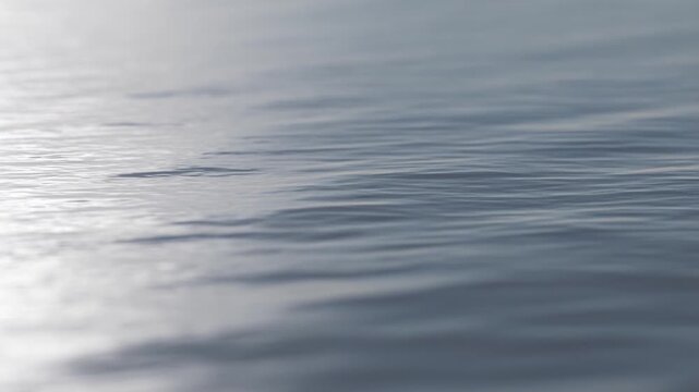 A reflective liquid ripple effect with slow expanding circles and soft mirrored highlights