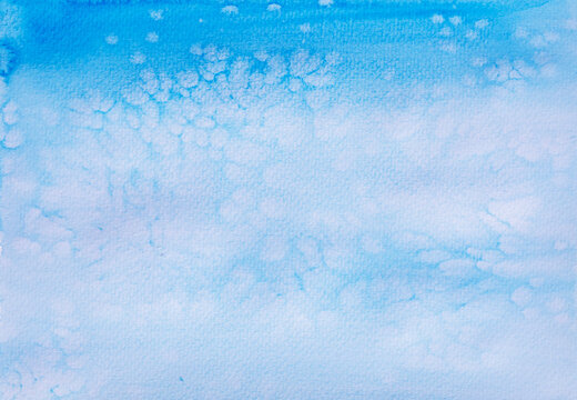 blue watercolor painted with Salt Effect on White Paper, background or texture with gradients shadow horizontal shape, copy space (High resolution), real photo