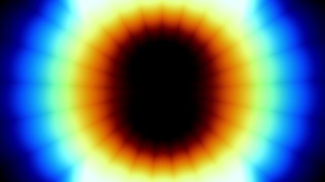 Blue orange and black eclipse or halo shaped glow forming a dark circular void surrounded by radiant colorful light with a smooth glowing aesthetic