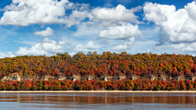 Brightly colored Fall foliage covers the bluffs along the Mississippi River near Grafton, Illinois 