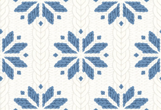 Blue snowflake shapes in knitted pattern on white background