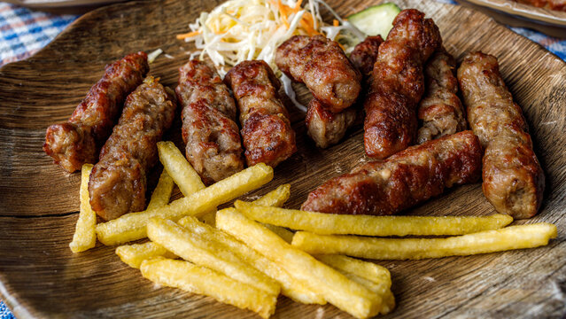 Enjoying cevapi and fries at a local restaurant in Sarajevo during lunch time