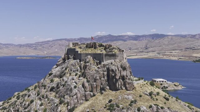 Aerial Drone View of Pertek Castle on Keban Reservoir in Tunceli, Turkey with Historic Fortress Landscape