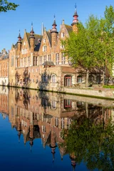 Architecture of old Bruges facing Groenerei (Green) canal, Belgium © Mistervlad