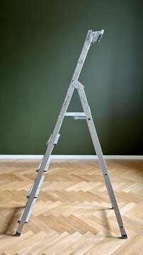Step Ladder Standing on Herringbone Parquet Floor