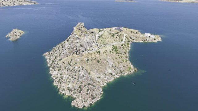 Aerial Drone View of Pertek Castle on Keban Reservoir in Tunceli, Turkey with Historic Fortress Landscape