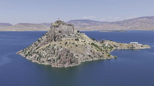 Aerial Drone View of Pertek Castle on Keban Reservoir in Tunceli, Turkey with Historic Fortress Landscape