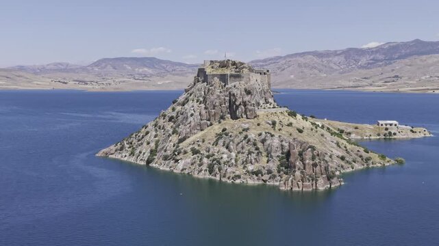 Aerial Drone View of Pertek Castle on Keban Reservoir in Tunceli, Turkey with Historic Fortress Landscape