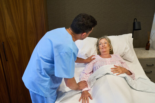 Nurse Attending to a Senior Patient in a Rehabilitation Facility