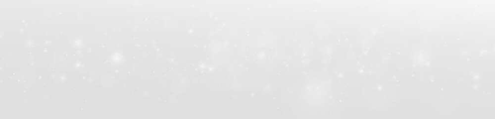 White dust shines gently with radiant floating particles over a luminous backdrop. Tiny shimmering lights create clean and elegant compositions. White dust PNG. © Hohstock