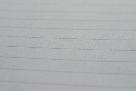 Empty page of a lined notebook, perfect for back to school theme.
