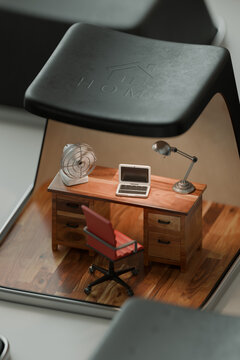 3D home office key with miniature desk interior