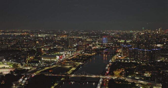 NYC New York Aerial v265 flyover Harlem river capturing traffic on bridges and riverside drive and illuminated cityscape of Bronx and Upper Manhattan at night - Shot with Inspire 3 8k - September 2023